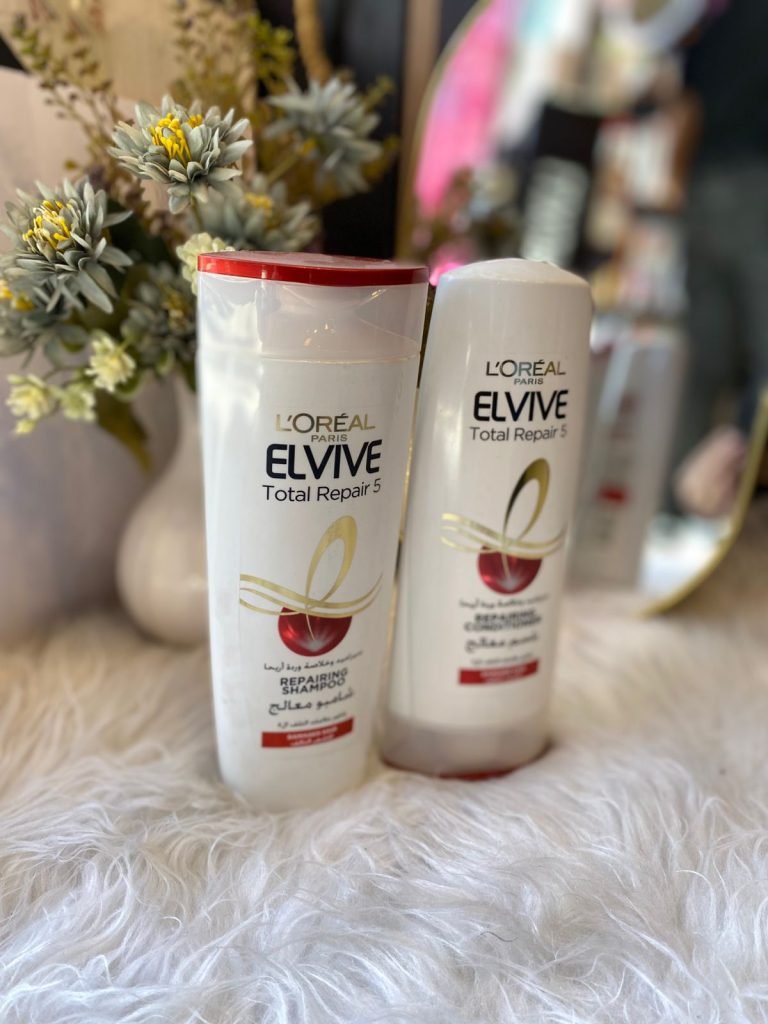 شامبو (Repairing Shampoo) وبلسم (Repairing Conditioner).